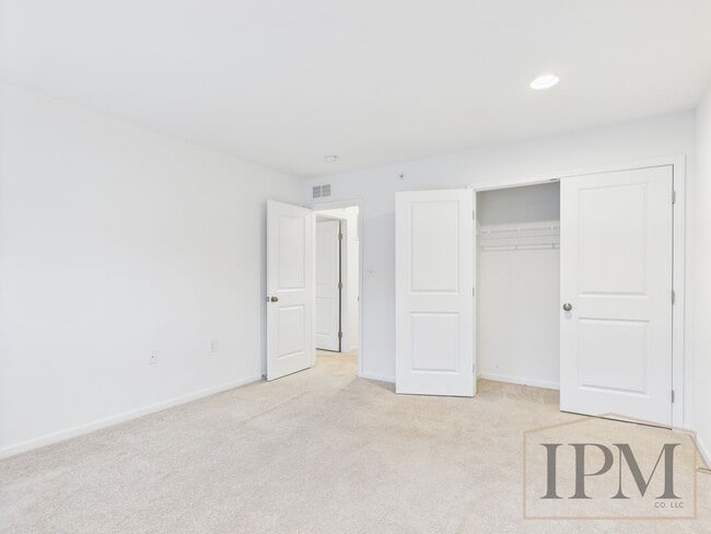 Building Photo - 2-bedroom 2.5 bath Luxury Townhome located...