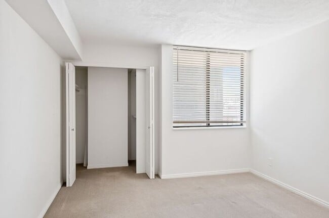 Building Photo - 2BR Condo w/ Covered Parking and Balcony Views at Broadway Towers