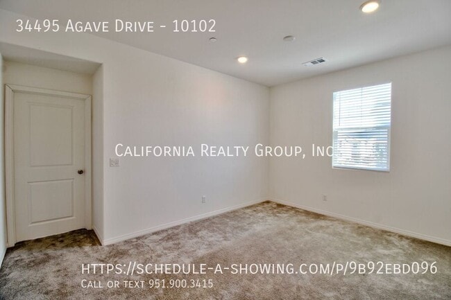 Building Photo - 34495 Agave Dr
