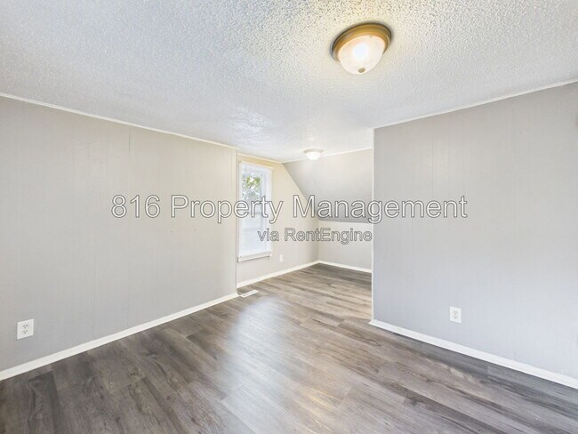 Building Photo - 6808 S Benton Ave