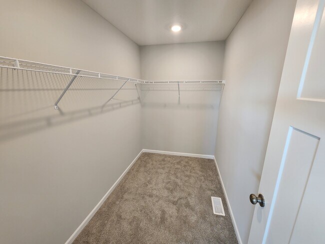 Primary bedroom closet - 13616 Busch Ln