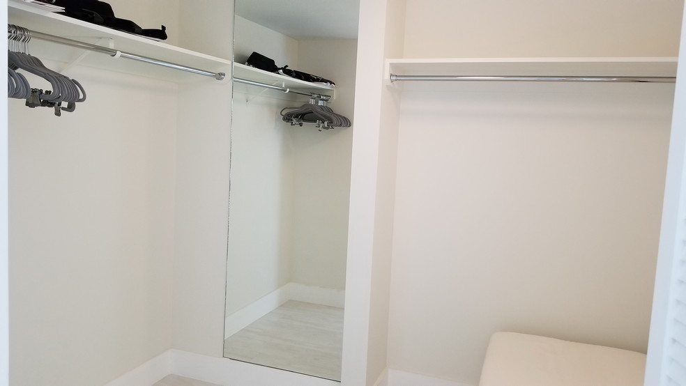 Walk- in closet. - 1837 Kalakaua Ave