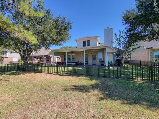 Building Photo - Welcome home to this charming 4-bedroom, 3-bathroom brick house in the desirable Stone Gate commu...