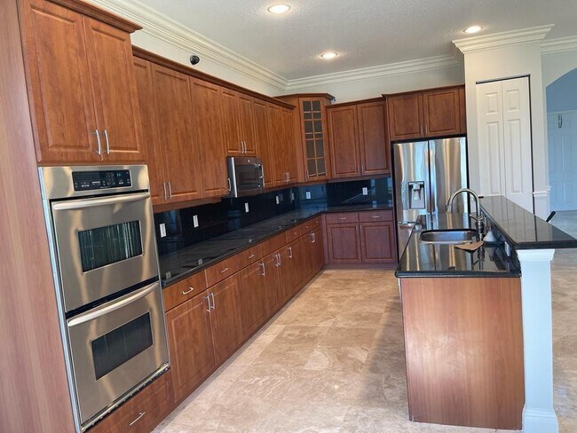 Building Photo - 9326 Plantation Estates Dr