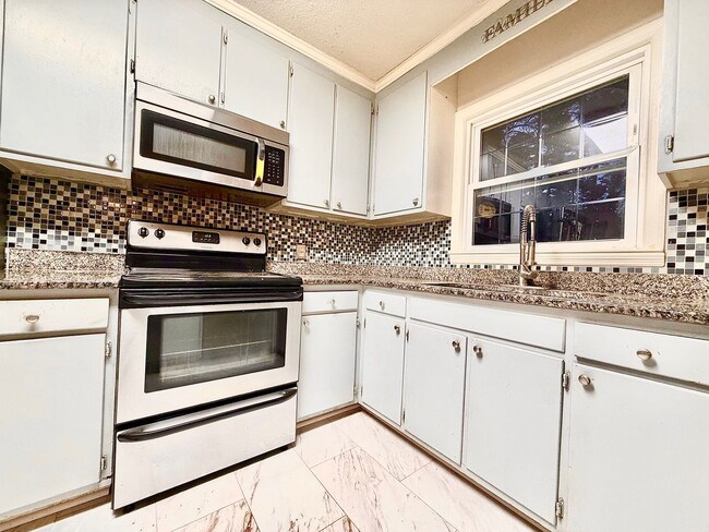 Building Photo - Charming Ranch with Fireplace, Two Living Areas & Large Lot – Minutes to Downtown