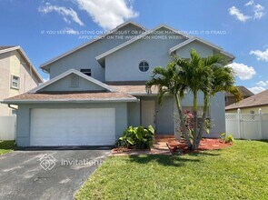 Building Photo - 9760 SW 9th Ct