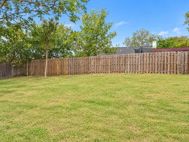 Building Photo - 4 Bedroom Home in Heritage Farms with Fireplace, Covered Patio and 2 Car Garage