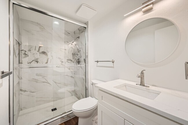 Building Photo - Completely Updated 2 Bedroom 2 Bathroom Condo Available NOW! Garage Parking Included!