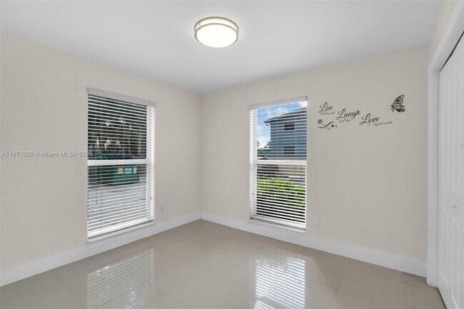 Building Photo - 241 S Royal Poinciana Blvd