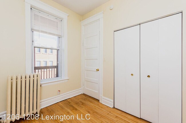 Building Photo - 1206-1208 W Lexington St