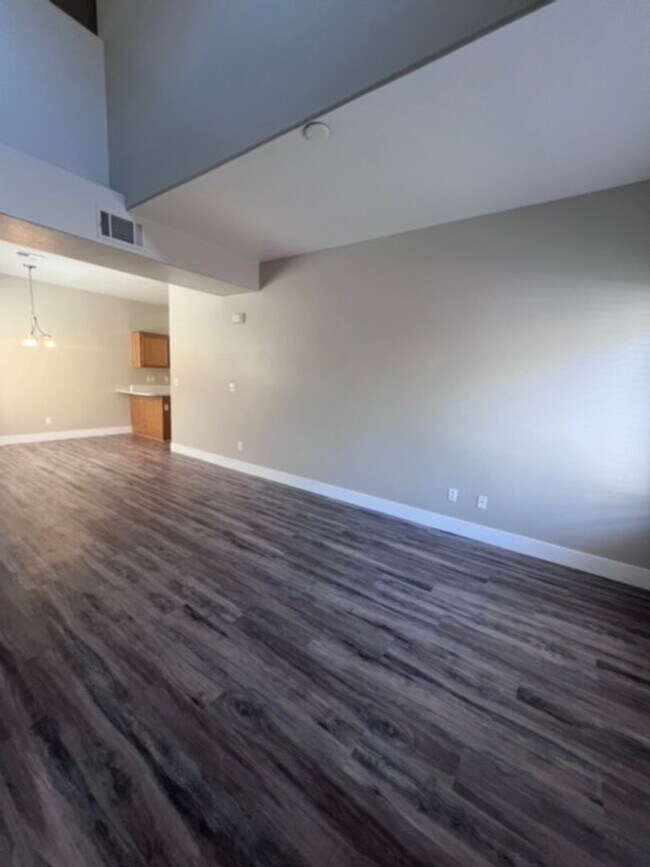 Building Photo - Three bedroom townhouse with 2 car garage