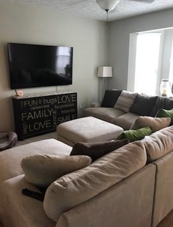 Living room is comfy for big furniture yet still cozy. - 231 Legacy Lane