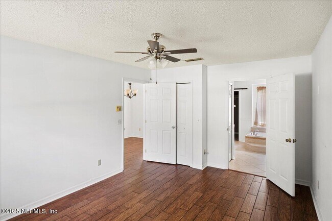 Building Photo - 10334 Triple Crown Ave
