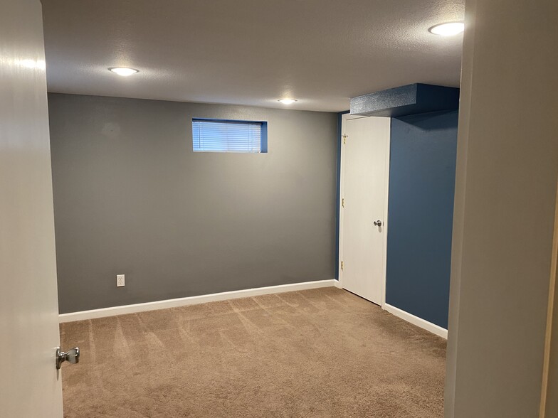 Bedroom 3 in basement, has another window (egress), not in photo - 9003 SE Stephens St