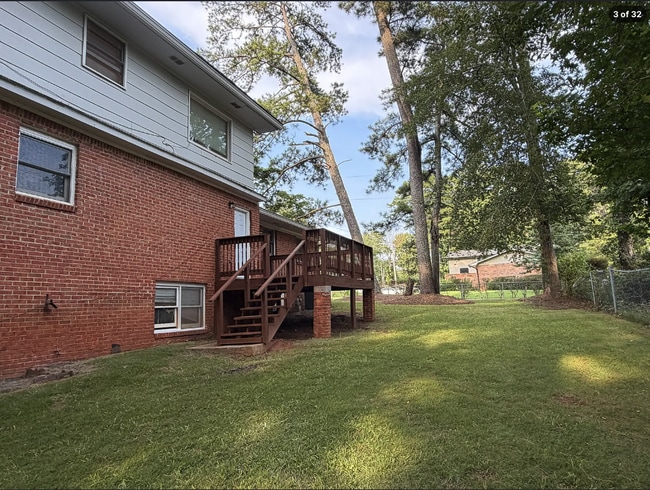 Building Photo - AVAILABLE NOW – FAIRBURN, GA 4 Bedrooms + Flexible Main-Level Living Space | Full Bathroom on Mai...