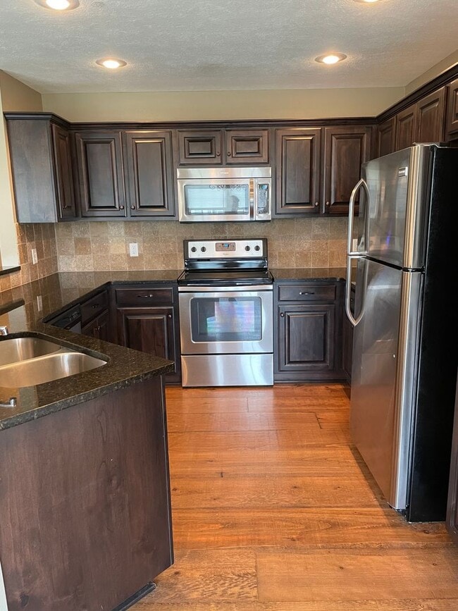 Building Photo - Beautiful all brick, 3-bedroom Republic Home