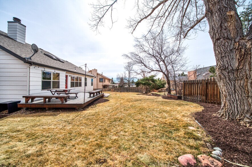 Common space deck with string lights - 5165 Granby Cir