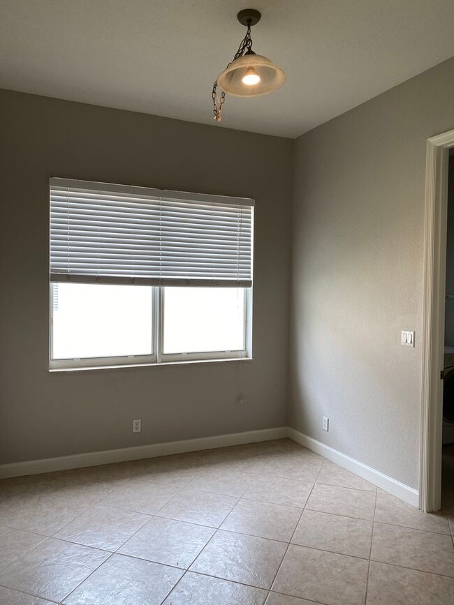Building Photo - SPACIOUS 3/2 IN SAINT JAMES GOLF COMMUNITY