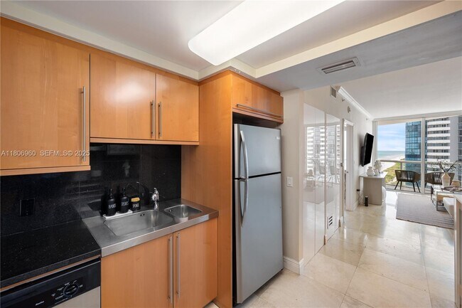 Building Photo - 6365 Collins Ave