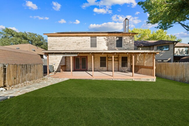 Building Photo - Sign your lease and receive a FREE 50" TV!!!  "Spacious 4-Bedroom Retreat with Fireplace in Charm...