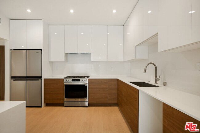 Building Photo - 10630 Wilkins Ave