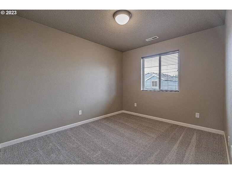 Building Photo - 5310 SE Redberry Pl