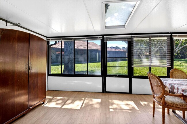 Building Photo - 10938 Roebelini Palm Ct