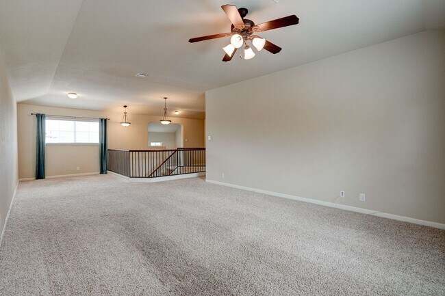 Building Photo - Bright & Roomy 4BR • 2.5BA • Two-Level Living