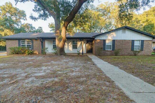 Building Photo - Charming Corner Haven 4BR/3BA Brick Home for Rent