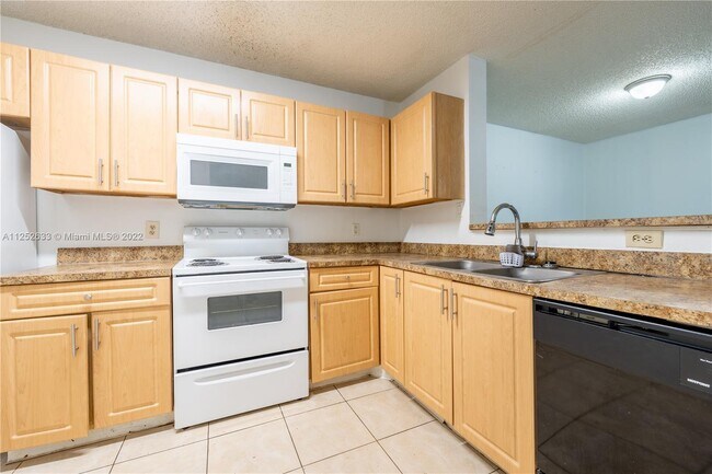 Building Photo - 11205 W Atlantic Blvd  106 Coral Springs F...