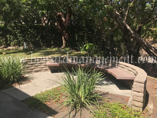 Building Photo - Bonus Den! Beautiful lower condo with large patio in Tara Hills, a resort style living complex!