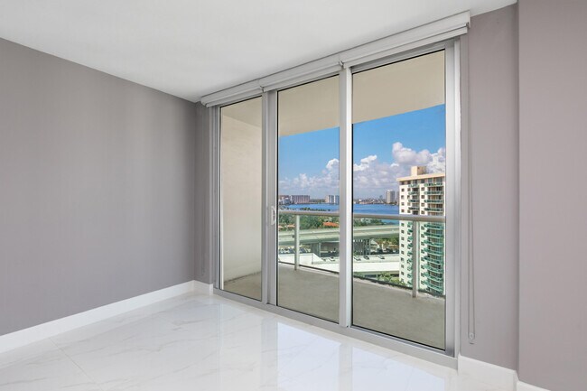 Building Photo - 19380 Collins Ave