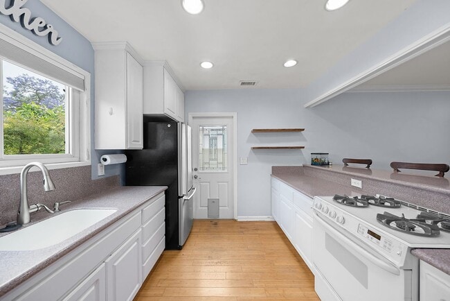 Building Photo - Beautiful 4 Bedroom Home with Smart Features, Entertainer’s Backyard & Attached Garage