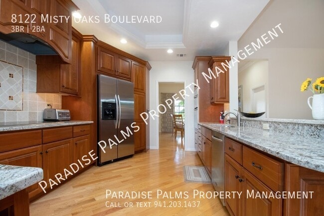 Building Photo - 8122 Misty Oaks Blvd