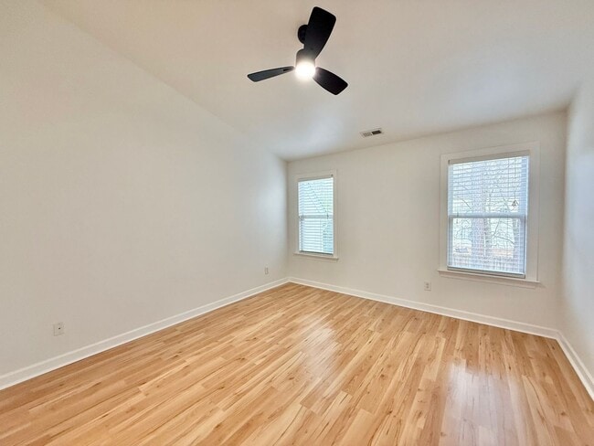 Building Photo - Modern 3BD, 2.5BA End Unit Raleigh Townhome with HOA Amenities Near I-540 & Triangle Town Center