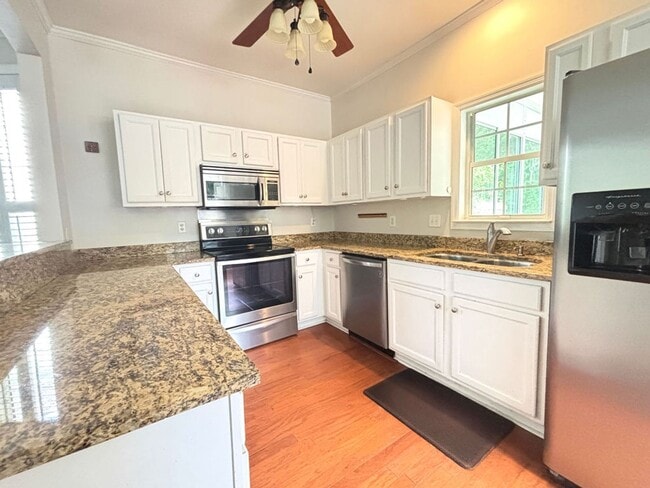Building Photo - Available now. Great 3 BR/2.5 BA Home Avai...