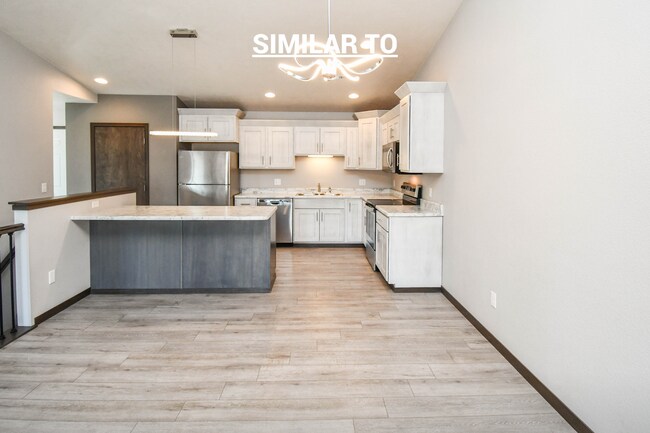 Building Photo - East Sioux Falls 4-Bedroom Townhome – Style, Space & Convenience!