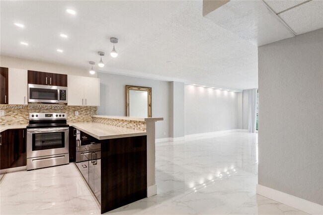 Building Photo - 19380 Collins Ave