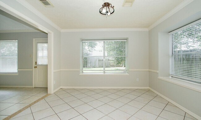 Building Photo - 4 Bedroom 2 Bathroom Cypress Home with Fireplace and Fenced Backyard