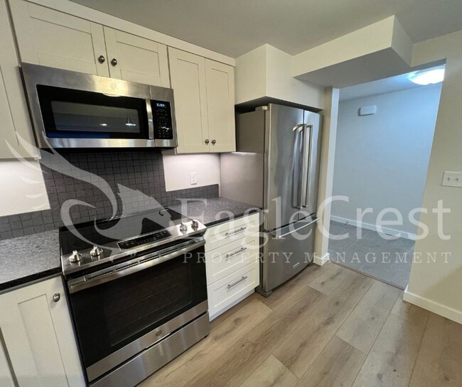 Building Photo - Lovely Two-Bedroom Condominium Located in ...