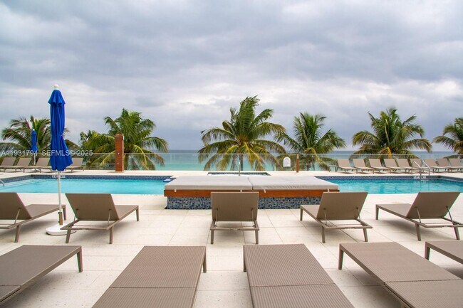 Building Photo - 18911 Collins Ave