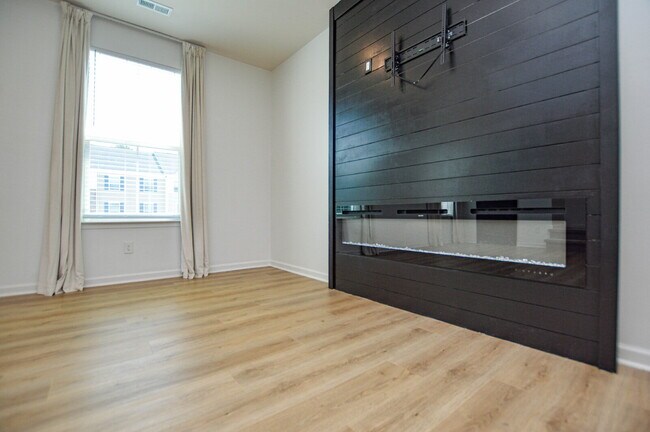 Building Photo - 3 Bedrooms | 2.5 Bathrooms | Lower-Level Flex Room | Approximately 1,978 Square Feet | 2-Car Gara...