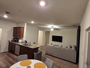 Building Photo - This stunning three-bedroom, two-bathroom home offers an incredible amount of space and upgrades,...