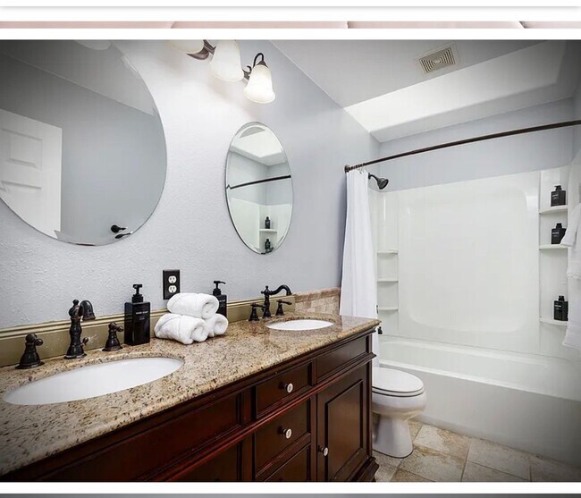 Building Photo - * FULLY FURNISHED * -3 levels, 7 bedrooms , lower level apartment with separate entrance *Home ba...