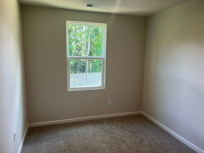 Building Photo - New Three-Bedroom, Two and one-half Bath T...