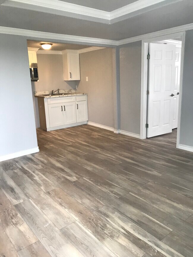 wooden floors throughout - 8125 Airlift Ave