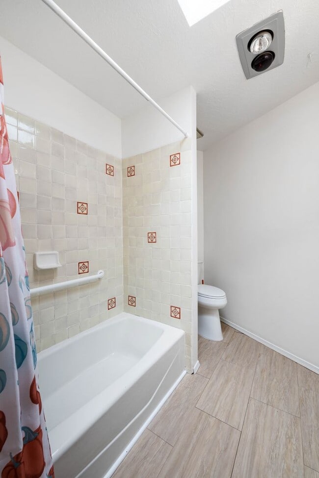 Building Photo - NEW MOVE-IN SPECIAL! Vibrant Home Off Rode...