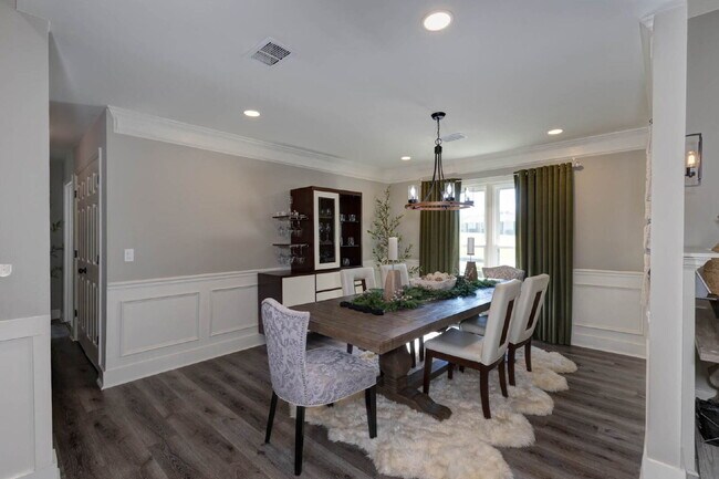 Building Photo - COMING SOON · Designer Renovation · Covered Deck Pavilion · 2-Car Garage · Lawn Care Included