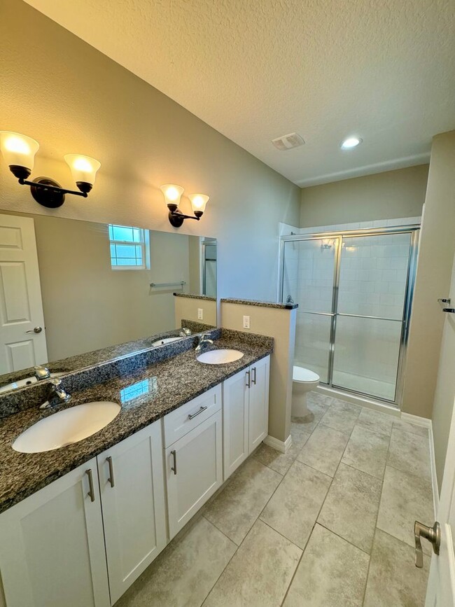 Building Photo - Move in ready 3/2 New Construction Townhou...