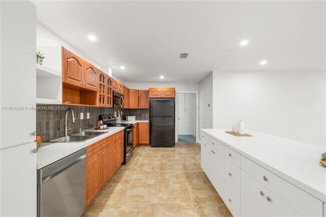 Building Photo - 7312 NW 58th Ct